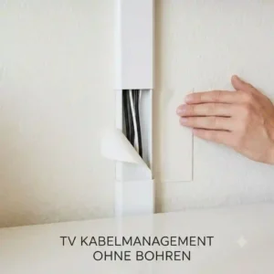 A close-up of a white self-adhesive tv cable channel being applied to the wall.