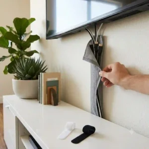 A flexible fabric tv cable sleeve no drilling bundling multiple cables together.